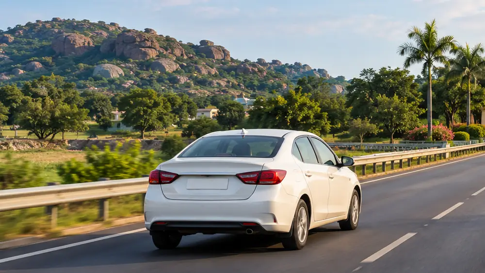 A car on the highway on the way from Jagtial towards Hyderabad